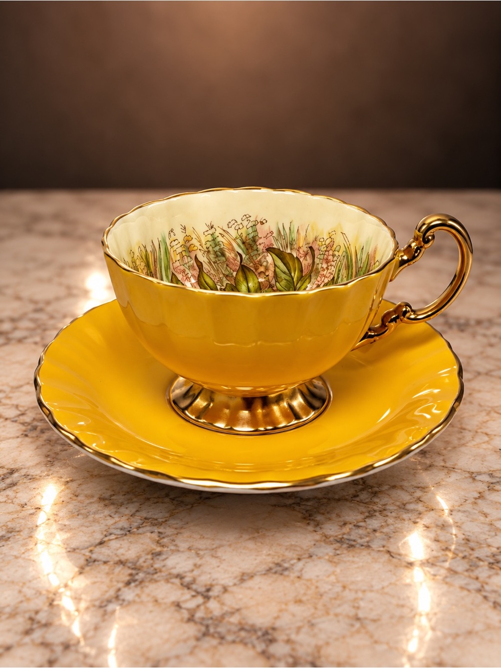 Vintage-Style Yellow Aynsley Teacup and Saucer with Floral Interior